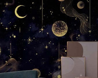 May include: A dark blue celestial-themed wallpaper design featuring a crescent moon, stars, and planets in shades of gold. The design includes a sofa and framed artwork, creating a cosmic and artistic atmosphere.