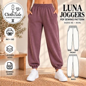 Op de afbeelding: Pruimkleurige joggingbroek met een elastische tailleband en boorden bij de enkels. De afbeelding bevat de tekst: LUNA JOGGERS PDF SEWING PATTERN SIZES XS - XXXL, A4 + A0, LAYERED SIZES, SEWING GUIDE en een logo van ClothTide Sewing Patterns met lijntekeningen.