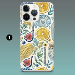 May include: A clear phone case featuring a watercolor design of lemons, figs, blueberries, and blue and white plates. The case has a white background with green leaves and a jar of preserves. The phone case is designed to fit a smartphone.