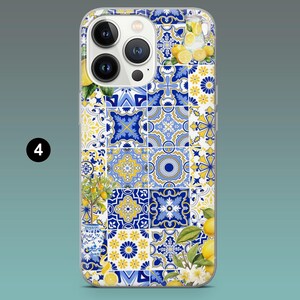 May include: A phone case featuring a vibrant, tiled pattern in blue, yellow, and white. The design incorporates lemon and floral motifs, with a number "4" in a black circle in the corner. The case has a clear border.