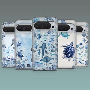 May include: Five phone cases with marine life designs. Each case features a different sea creature, including turtles, seahorses, and whales, in shades of blue and white. The cases have a clear, glossy finish and a modern design.