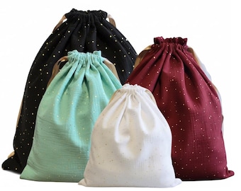 Zero-waste gift wrapping, cotton fabrics and gold ribbons, gold polka dot patterns, reusable drawstring bag, jewelry, storage and travel, Christmas
