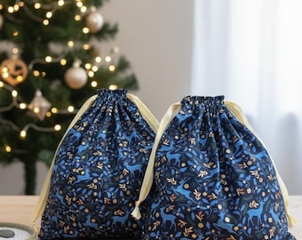 Zero-waste gift wrapping, cotton fabrics and gold ribbons, nature-inspired deer motifs, reusable drawstring bag, jewelry, storage, travel, Christmas