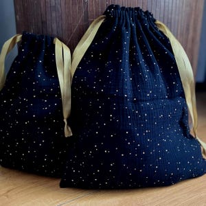 Zero waste gift wrapping, cotton fabrics and gold ribbons, gold polka dot patterns, reusable drawstring bag, jewelry, storage and travel, Christmas