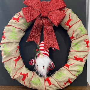 Gnome Christmas Wreath wrapped in Decorative Burlap that is covered in Red Reindeer and Green Trees