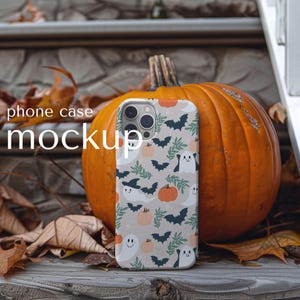 iPhone case mockup for Halloween, Tough cell phone cover mock up for Holiday, Phone clear case leaning on pumpkin for Fall, PSD template