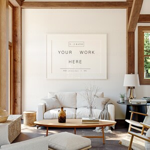 May include: A white sofa with cushions sits in a living room with a wooden coffee table and a framed poster that says "YOUR WORK HERE 3:2 RATIO PSD with Smart Objects + JPG".