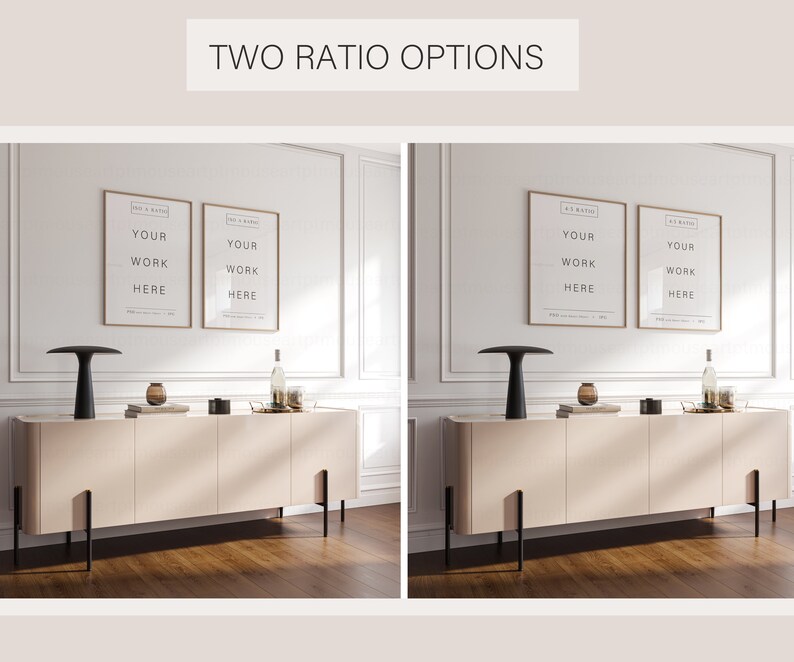 May include: Two framed prints with the text "YOUR WORK HERE" hanging on a white wall above a light beige cabinet with black legs. The cabinet is sitting on a wood floor. There is a black lamp on the left side of the cabinet and a bottle of wine on the right side of the cabinet.