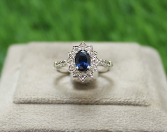 Vintage Sterling Silver Blue Sapphire Ring: CZ Diamond Halo