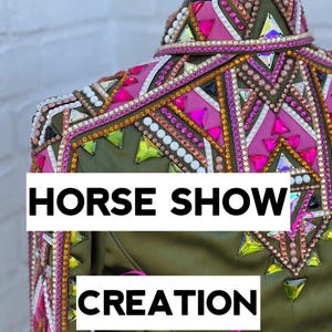 May include: Olive green horse show jacket with elaborate embellishments. The jacket features a vibrant design with pink, white, and iridescent gems. The text "HORSE SHOW CREATION" is displayed in white block letters.