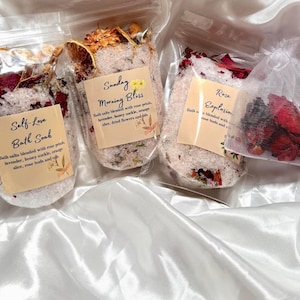 May include: A rustic wooden sign with the text "Welcome to our home" in white lettering. The sign features a distressed finish and a simple, inviting design, perfect for entryway decor.