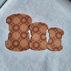 Whale tail style tab in 3 sizes.