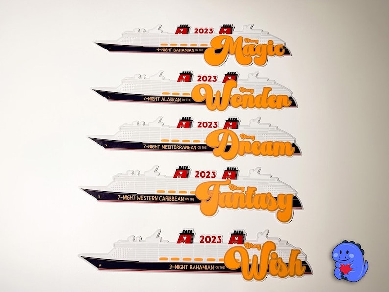 May include: White cruise ship cutouts with black and red accents, featuring orange text with the names "Magic", "Wonder", "Dream", "Fantasy", and "Wish". Each ship has the year "2023" and a cruise destination.