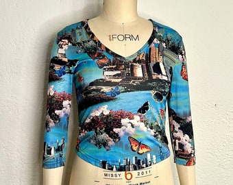 Cityscape Skyline V Neck Long Sleeve Shirt Blouse with the City Skyline of the Taj Mahal New York City and Butterflies Botanicals