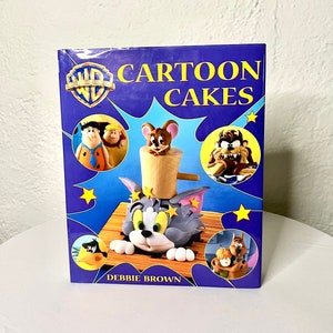 Cartoon Cakes Decorating Baking Cookbook by Cartoon Network, Warner Brothers, Hanna Barbera, and Looney Tunes Cartoon Cat Cake Recipe Book