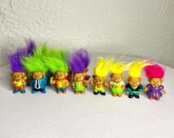 Mini Soma Good Luck Treasure Troll by Ace Novelty and Russ Berrie and Co featuring the Bodybuilder Troll with Pink Yellow Green and Purple