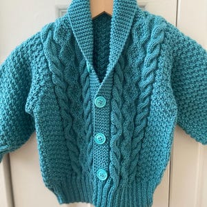 Hand-knitted baby cardigan, cable-knit, green extra-soft baby yarn, 6-12 months