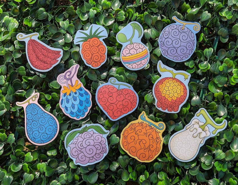 Puede incluir: Un conjunto de 11 pegatinas coloridas con diferentes dise&ntilde;os de frutas. Las pegatinas son todas redondas o en forma de pera y tienen un patr&oacute;n de espiral. Los colores incluyen rojo, naranja, amarillo, verde, azul y morado.