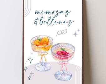 May include: A framed print featuring watercolor illustrations of two cocktails, one with an orange slice and the other with red berries. The text "mimosas & bellinis" and "xoxo" are written above the cocktails.