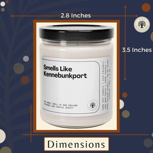 a jar of smells like kennebunkport sits in front of a blue