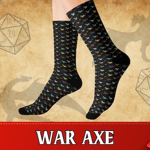 May include: A pair of black socks with a colorful dragon pattern. The socks have the text "WAR AXE" printed on the bottom.