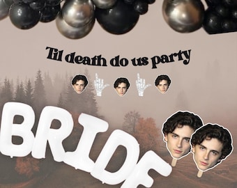 May include: A party decoration set with black, silver, and white balloons. The phrase "Til death do us party" is above the word "BRIDE" in white balloon letters. Includes face cutouts and skeleton hand stickers.