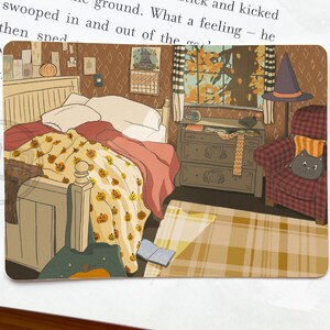 May include: A rectangular illustration depicts a cozy bedroom scene. A bed with a pumpkin-patterned blanket and a red blanket is the focal point. A witch's hat sits on a chair, and a window reveals autumn foliage. A dresser and a rug complete the scene.