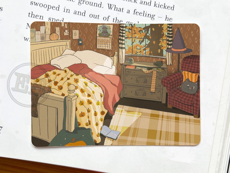 May include: A rectangular illustration depicts a cozy bedroom scene. A bed with a pumpkin-patterned blanket and a red blanket is the focal point. A witch's hat sits on a chair, and a window reveals autumn foliage. A dresser and a rug complete the scene.