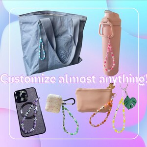 May include: A collection of beaded accessory straps in various colours attached to a grey tote bag, a pink water bottle, a dark phone case, a speckled earbud case, a small tan pouch, and a yellow keychain with a green leaf charm. Text reads: Customize almost anything!