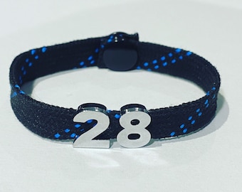 Hockey Skate Lace Bracelet - black with blue flecks + jersey number