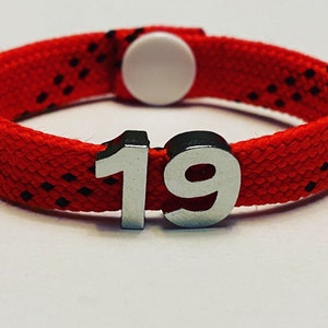 Hockey Skate Lace Bracelet - red with black flecks + jersey number