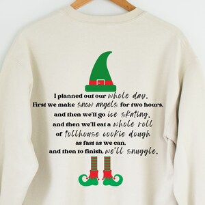 Elf film christmas jumper hotsell