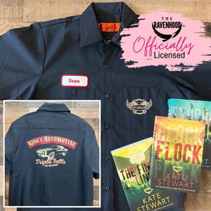 May include: A black work shirt with a name tag that says "Sean" and a logo that says "King's Automotive Triple Falls The Ravenhood". The shirt is officially licensed by The Ravenhood.