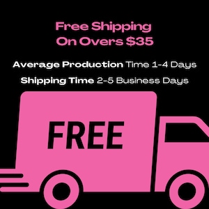 May include: Pink delivery truck with the word "FREE" in black text on the side. The truck has a white background and is moving to the right. The text "Free Shipping On Overs $35" is above the truck. The text "Average Production Time 1-4 Days" and "Shipping Time 2-5 Business Days" are below the truck.