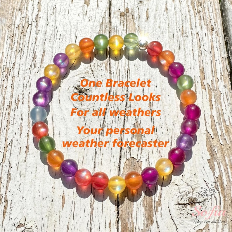May include: A circular beaded bracelet featuring translucent, multi-colored spheres in shades of orange, yellow, green, purple, and red. The text reads: One Bracelet Countless Looks For all weathers Your personal weather forecaster.