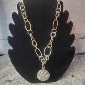White house black market, gold and silvertone pendant necklace
