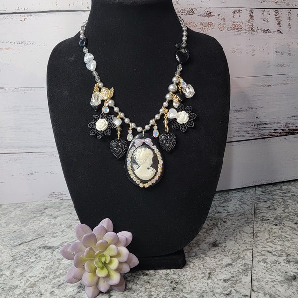 Tarina Tarantino Designer Necklace cameo with flower and crystal chams