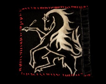 a variety of hand-made patches - sewn recycled denim