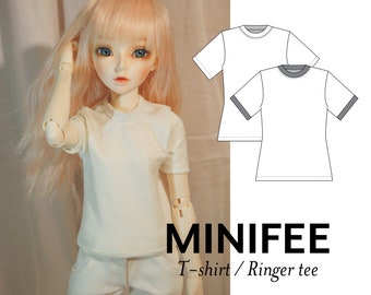 May include: A white t-shirt with short sleeves and a crew neck. The t-shirt has a ringer design with a gray trim around the neck and sleeves. The t-shirt is shown on a doll wearing white pants. The image also includes a line drawing of the t-shirt in white and gray. The text "MINIFEE T-shirt / Ringer tee" is below the image.