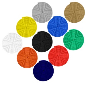 May include: Ten spools of rope in different colors, including white, black, yellow, blue, green, orange, red, and gray. The spools are arranged in a circle.