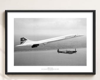 May include: A black and white framed print featuring a British Airways Concorde aircraft flying in formation with a Supermarine Spitfire over a coastline. The text below the aircraft reads British Icons, BAC Aerospatiale Concorde & Supermarine Spitfire, 12th June 1993.