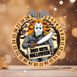 May include: Wooden Halloween countdown calendar featuring a masked figure holding a knife. The design includes a circular frame with numbers, bats, and the text "DAYS UNTIL HALLOWEEN". The top has a bat-shaped accent. The color palette includes brown, orange, and black.