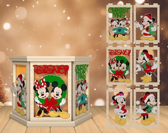 May include: A wooden lantern with six sides, each featuring a different Christmas-themed design. The designs include Mickey Mouse and Minnie Mouse dressed in festive attire, with the words "Disney" and "Christmas" on the lantern.