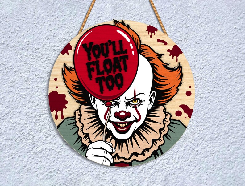 May include: Round wooden sign featuring a menacing clown with orange hair and a red nose, holding a red balloon with the text "YOU'LL FLOAT TOO." The sign has a rope for hanging and is decorated with blood splatters.