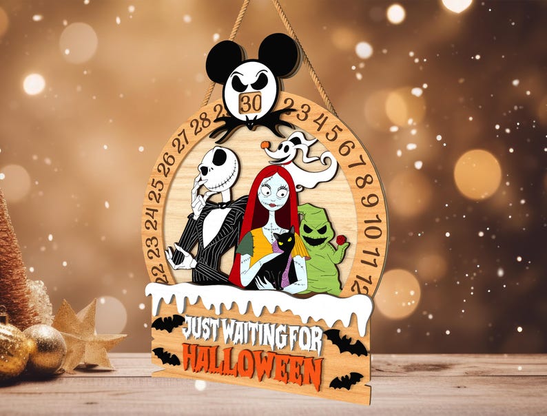 May include: Wooden Halloween countdown calendar featuring characters from The Nightmare Before Christmas. The design includes Jack Skellington, Sally, Zero, and Oogie Boogie. The text "Just Waiting for Halloween" is displayed below the characters.