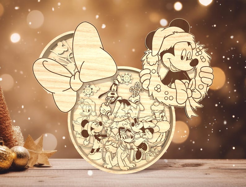 May include: A wooden Christmas ornament featuring Mickey Mouse and other Disney characters, including Minnie Mouse, Donald Duck, Goofy, and Pluto. The ornament is shaped like Minnie Mouse's head with a large bow on top.