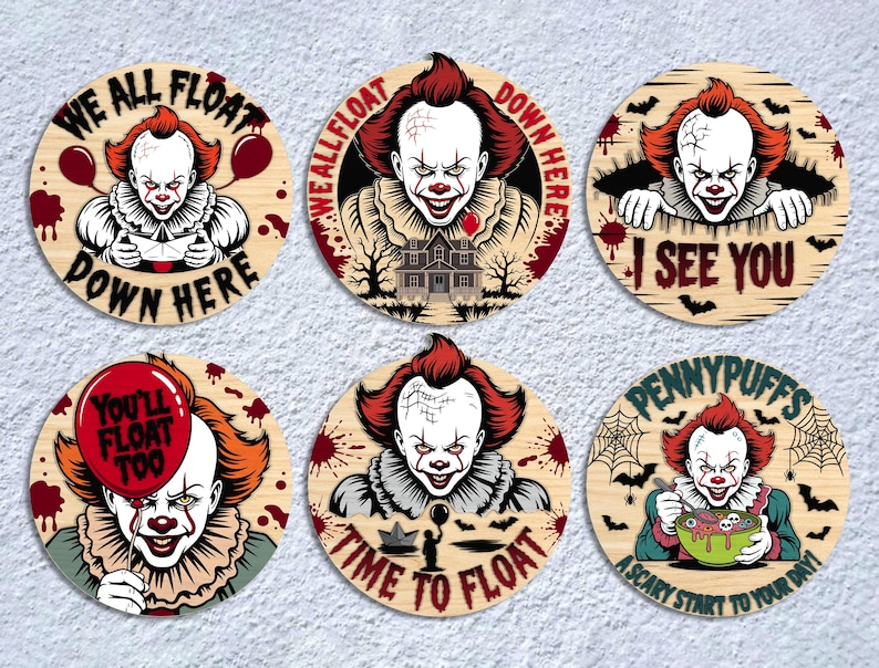 May include: Set of six wooden coasters featuring a scary clown design with red hair and makeup. Each coaster has a different phrase, including "We All Float Down Here" and "I See You". The coasters are round and have a light wood grain.