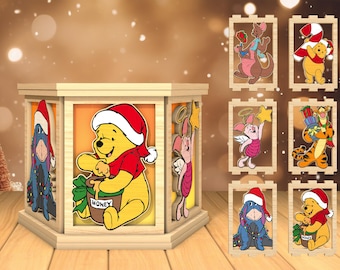 May include: A wooden Christmas lantern featuring a Winnie the Pooh theme. The lantern has a rotating carousel with various characters from the Winnie the Pooh franchise, including Winnie the Pooh, Piglet, Tigger, and Eeyore. The lantern is adorned with Christmas lights and decorations.