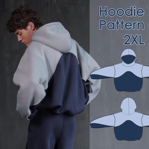 Op de afbeelding: Een tweekleurige hoodie in lichtgrijs en marineblauw, met een bijpassende joggingbroek. De hoodie heeft een grote capuchon en een colorblock-ontwerp. De afbeelding bevat ook een diagram van het hoodie-patroon, met het label "Hoodie Pattern 2XL."
