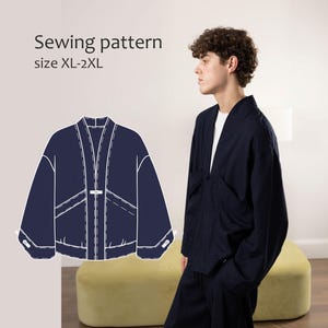 May include: A sewing pattern for a dark navy blue jacket in sizes XL-2XL. The graphic shows a technical line drawing of the jacket with a front closure, long sleeves, and pockets. The jacket features a V-neckline and a relaxed, loose fit.